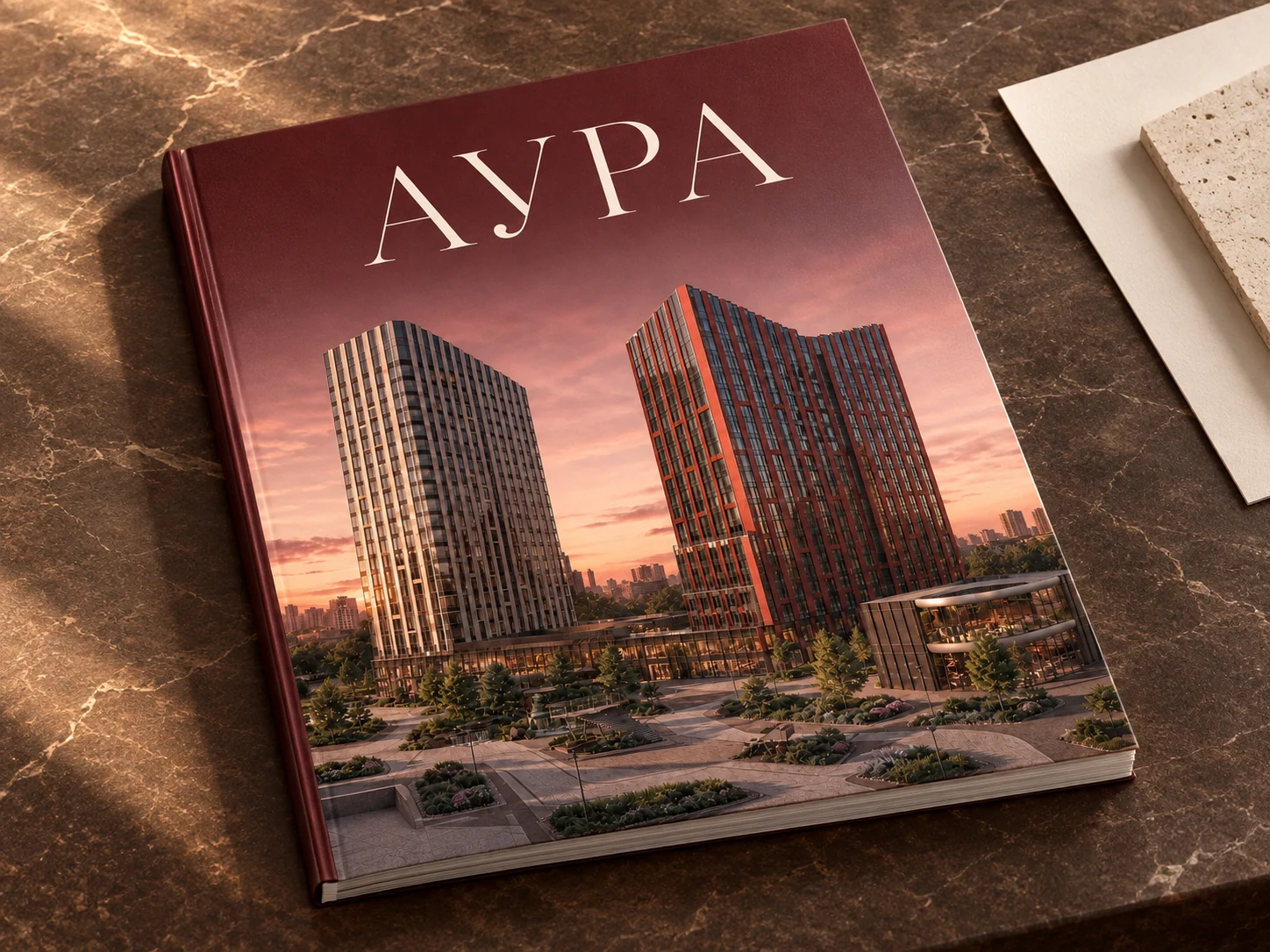 Каталог проекта АУРА с изображением двух жилых башен на обложке